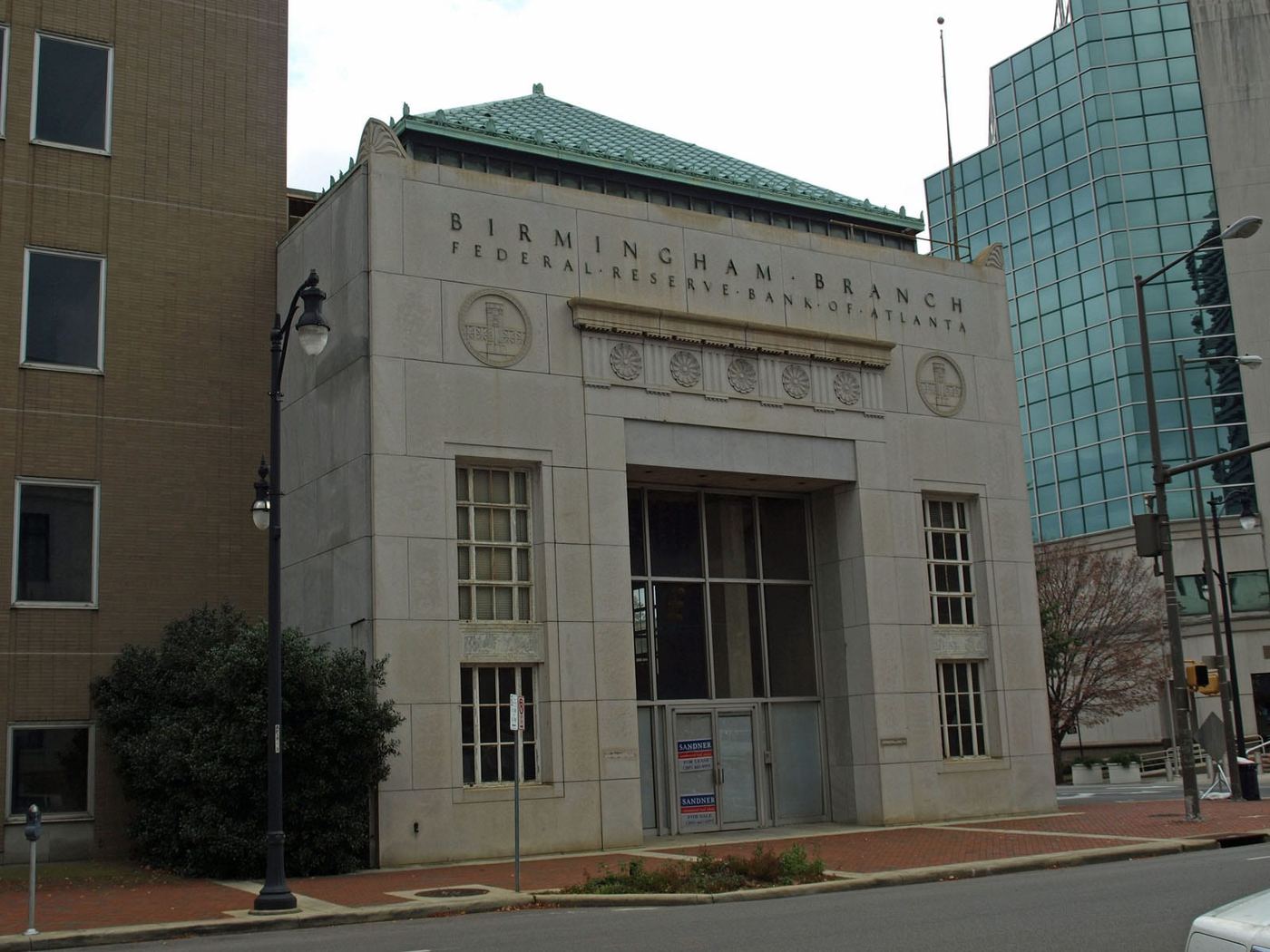 The limestone facade of the Birmingham Branch of the Federal Reserve Bank of Atlanta, with the branch name carved above the entrance